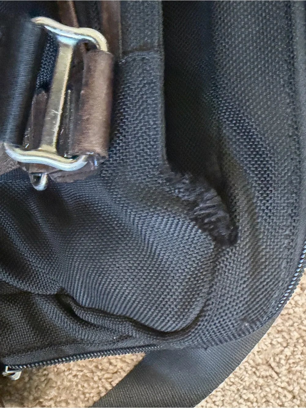 Tumi Black Backpack with Brown Leather Accents